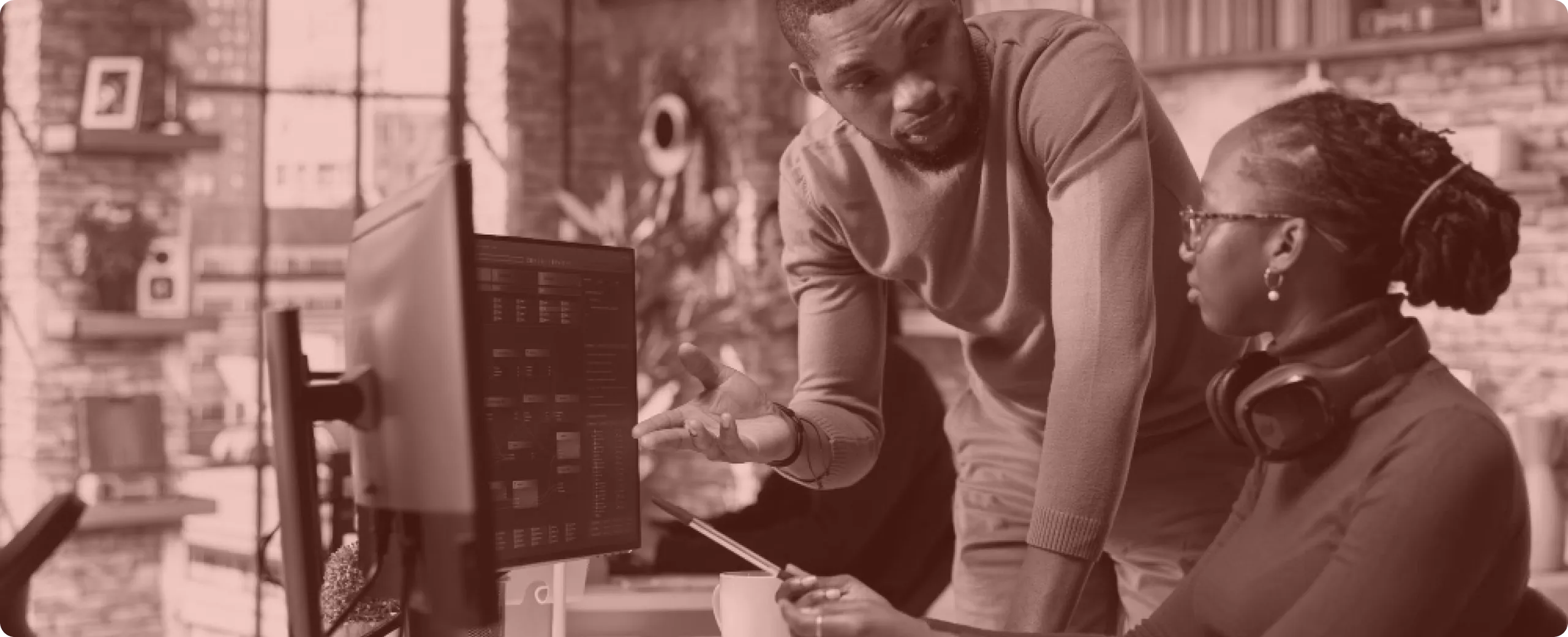 Team meeting discussing platform migration strategy