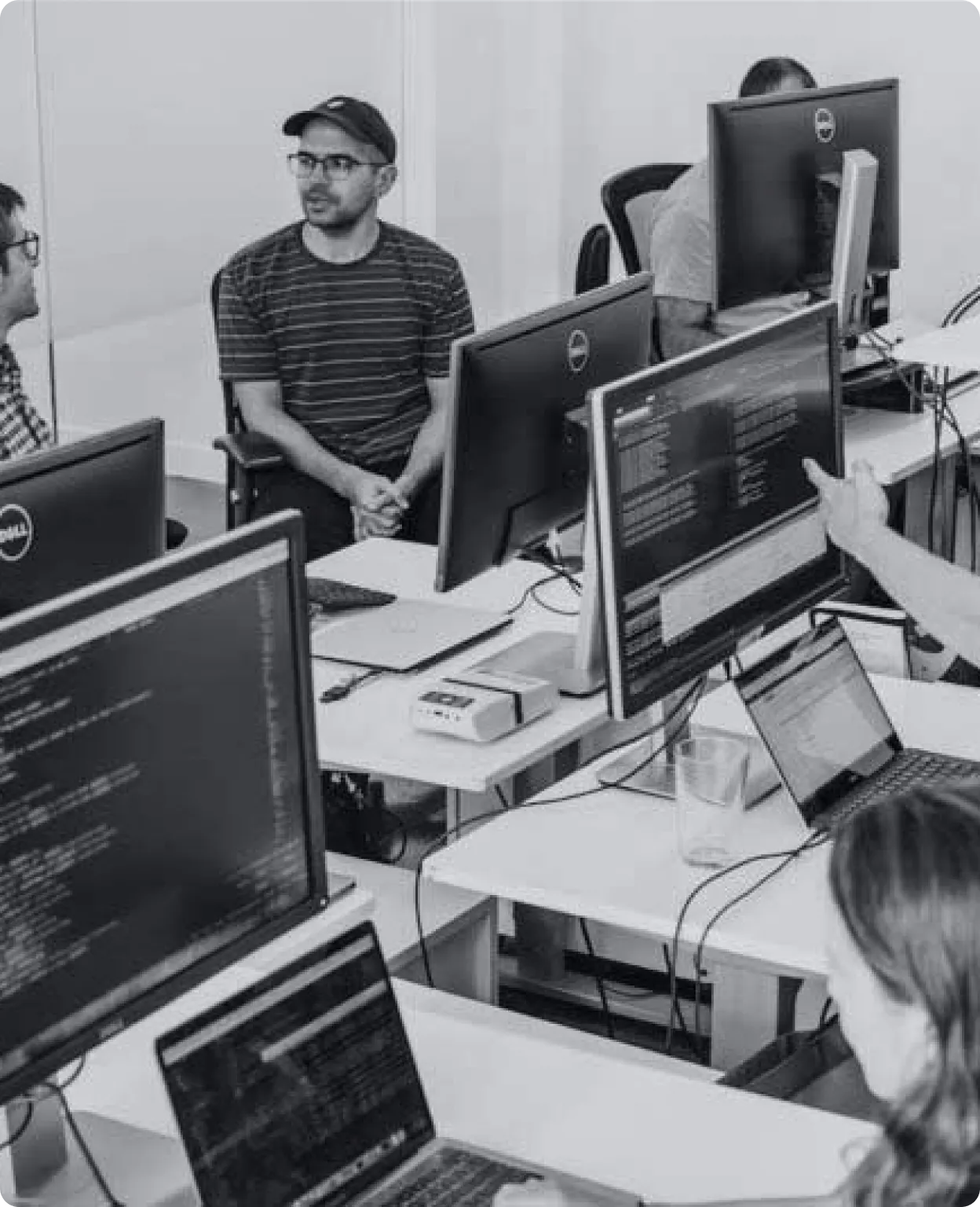 Developer working at monitors