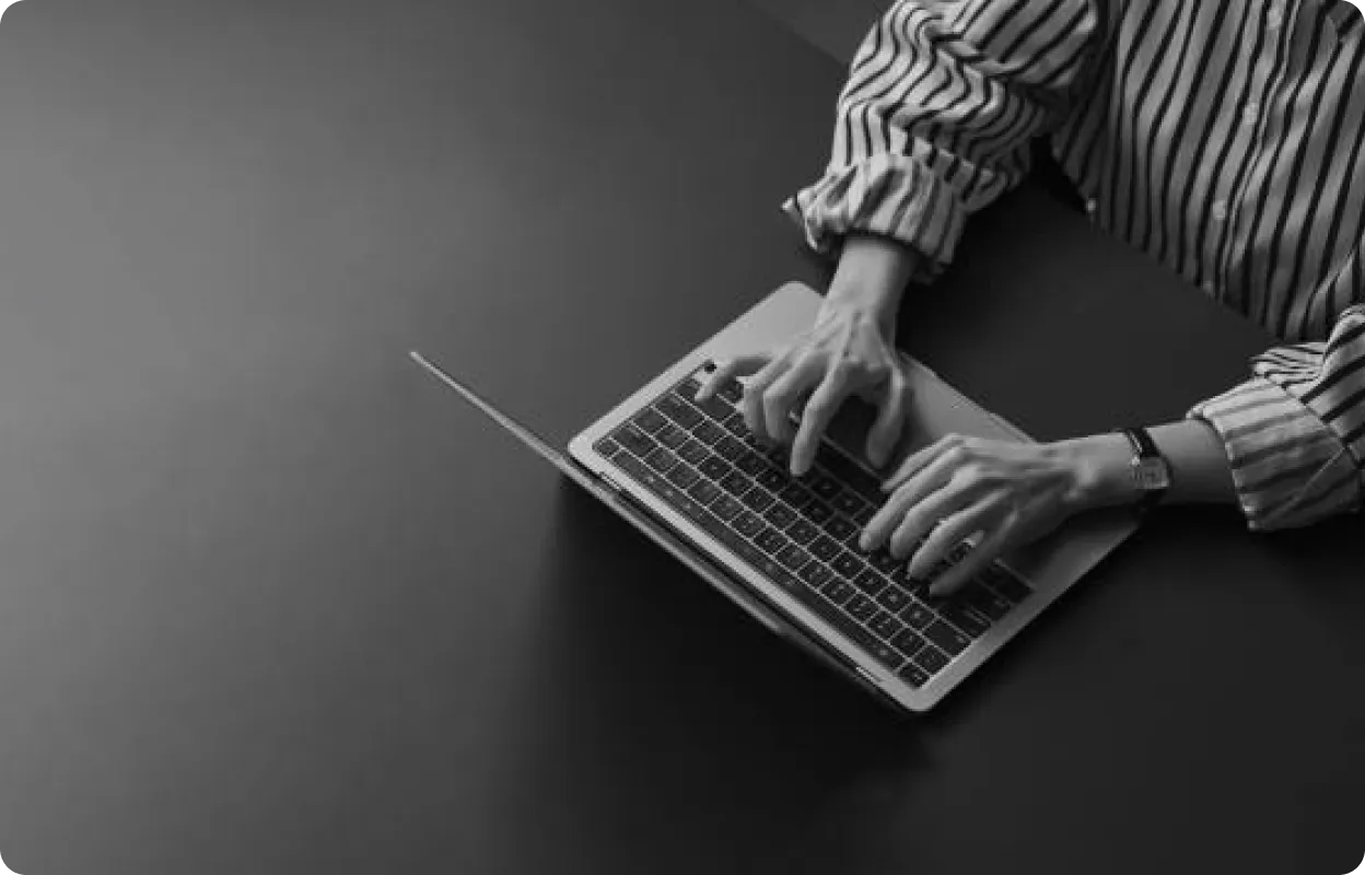 Professional working on laptop — SEO consultation