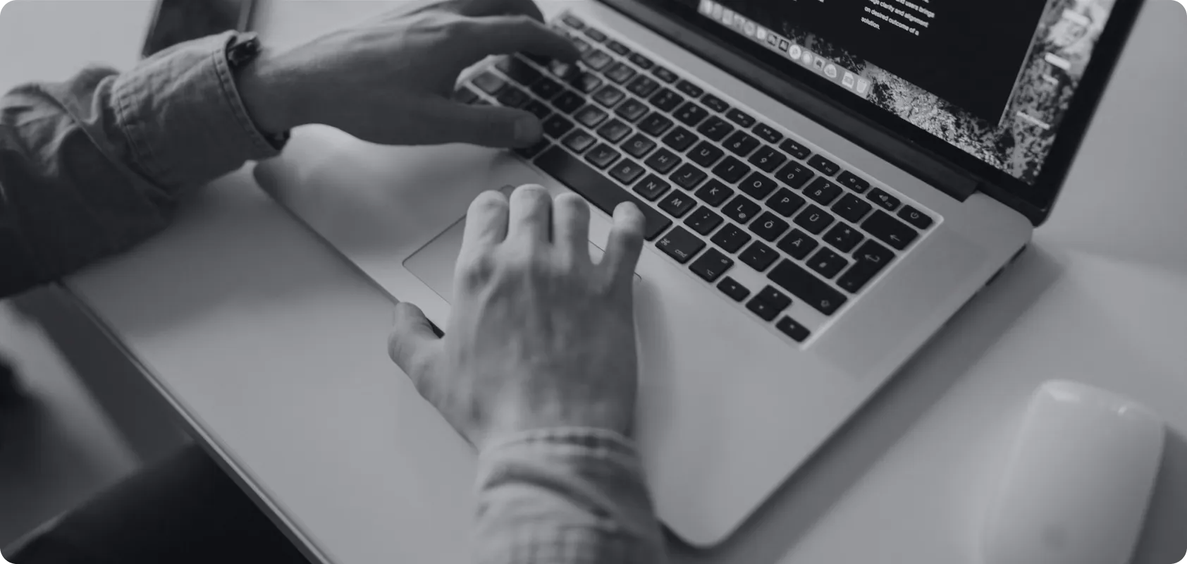 Hands typing on laptop — start your global personalization journey