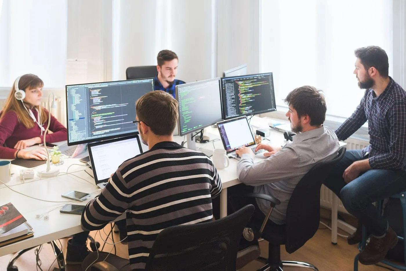 Development team working at monitors