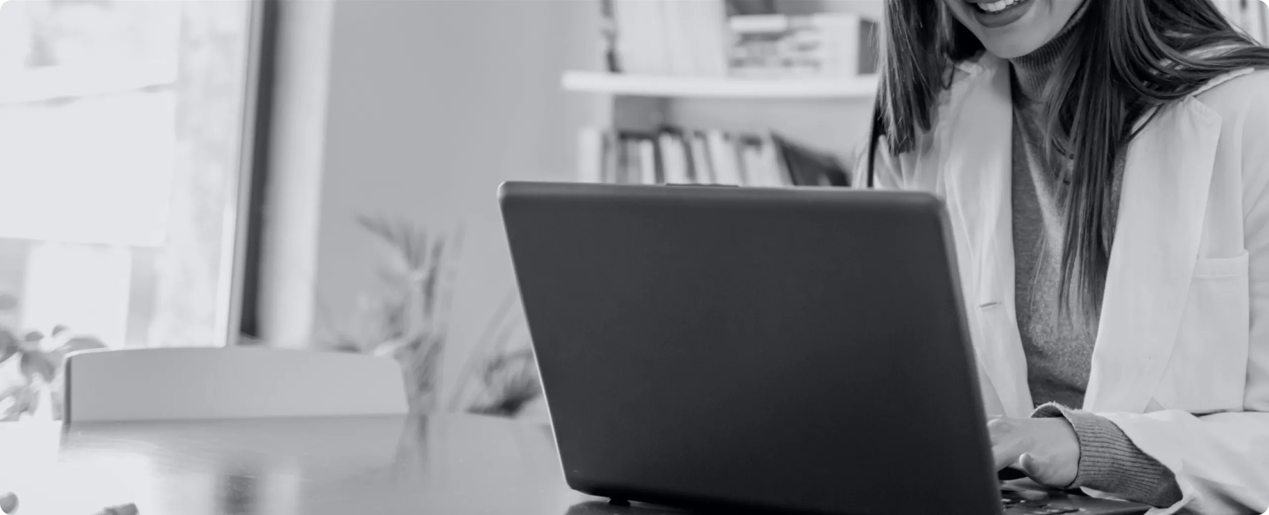 Woman working on custom ecommerce platform