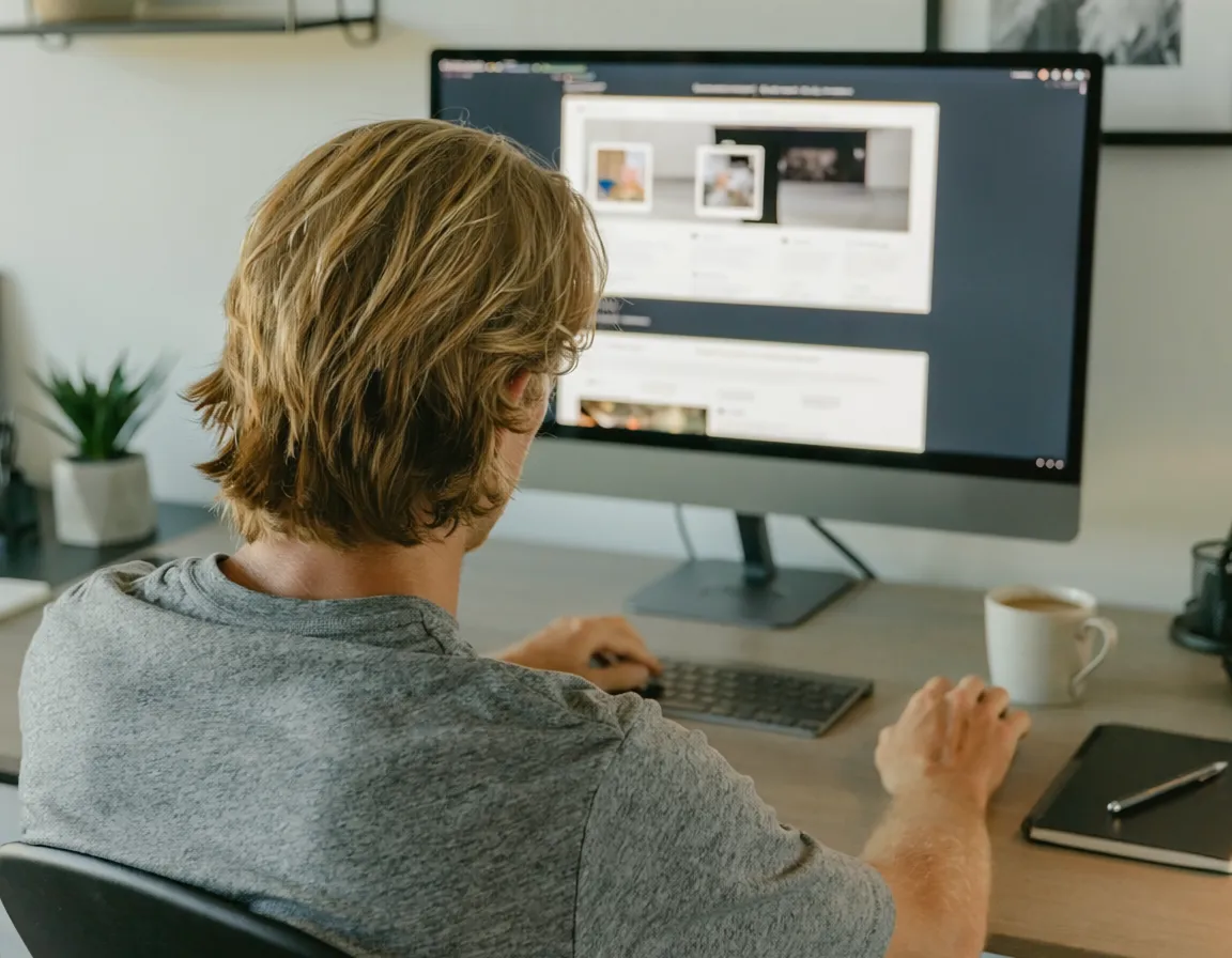 Person working at computer with checkout interface