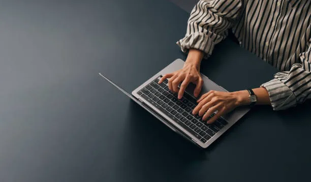 Designer working on laptop